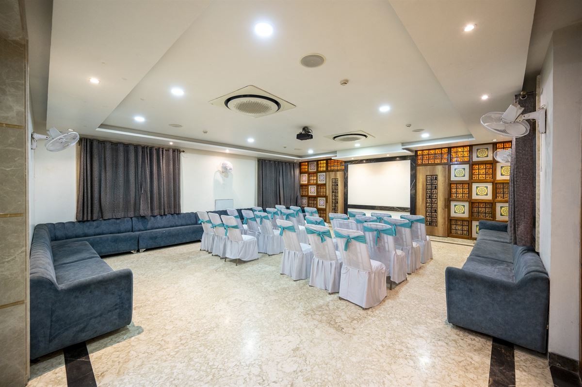 Shri Nilayam Kutir conference hall with projector and seating for 50